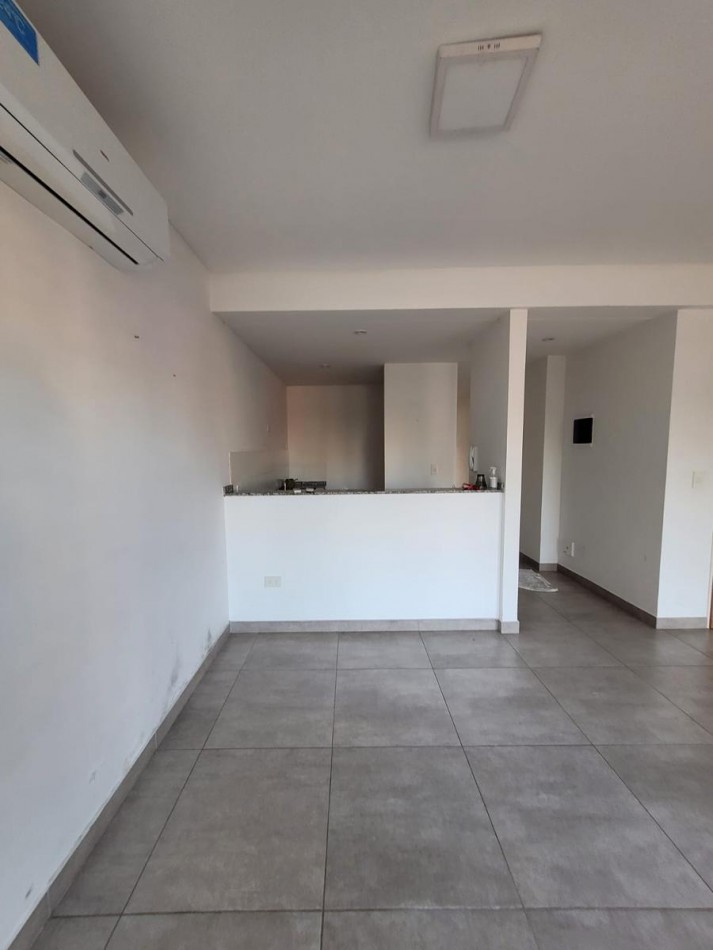 VENTA APTO CREDITO DOS AMBIENTES CON COCHERA MUÑIZ