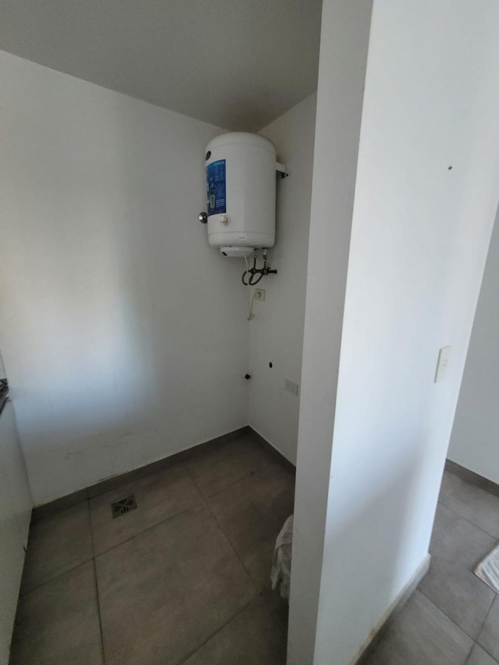 VENTA APTO CREDITO DOS AMBIENTES CON COCHERA MUÑIZ